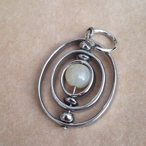 Vintage art Deco spinning quartz pendant